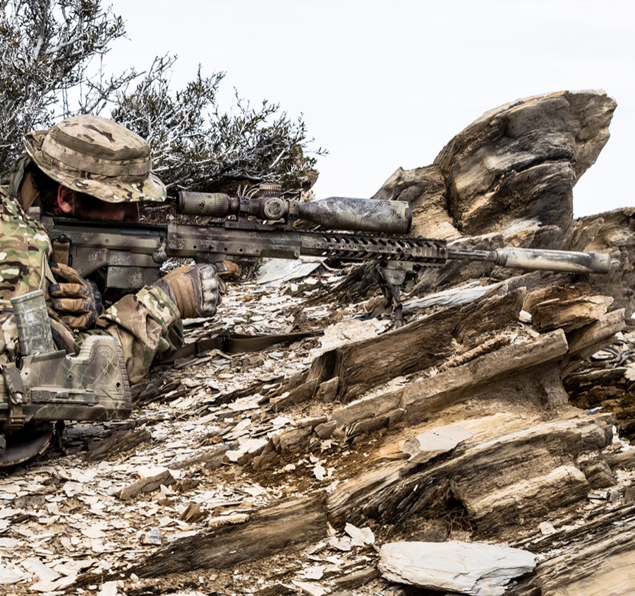 Prone shooter illustrating the endurance versus precision compromise